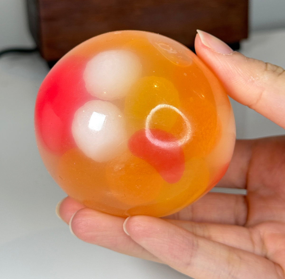 Relax and Unwind with Our Orange Crystal Ball Squishy Fidget Toy - Lynsolab